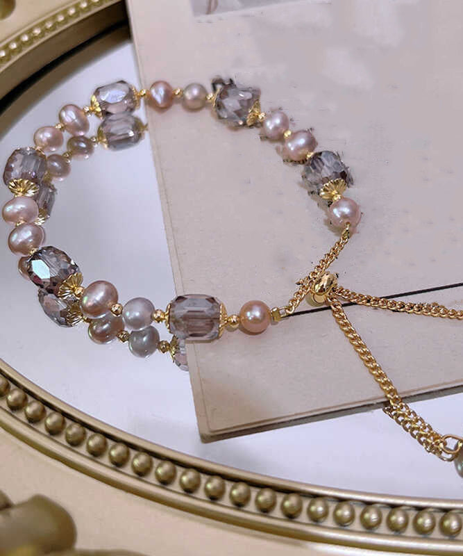 Wunderschönes Charm-Armband aus vergoldetem Sterlingsilber mit Perlen und Kristallquasten. Feine Halskette aus Sterlingsilber mit gebrochenem Silber und Schleierkraut ET004