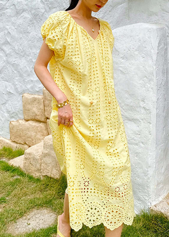 Robe longue en coton jaune à col rond et ajourée