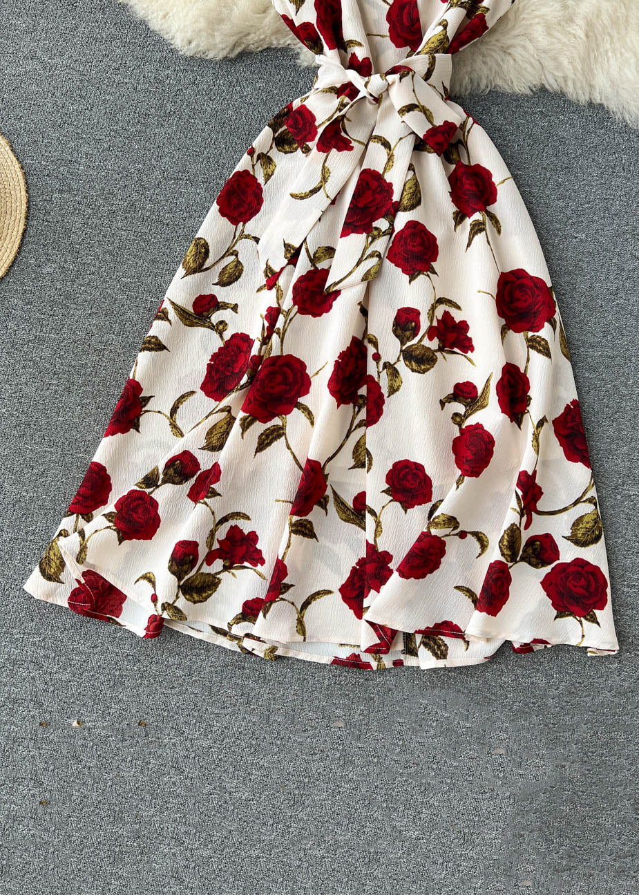 Schickes, apricotfarbenes, ärmelloses Chiffon-Kleid mit Reißverschluss und Print TR049