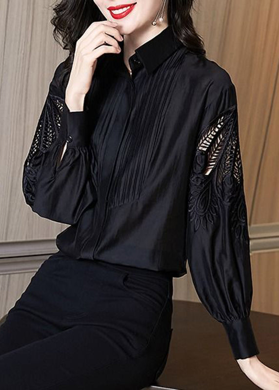 Chemise noire élégante brodée à manches bouffantes TE026