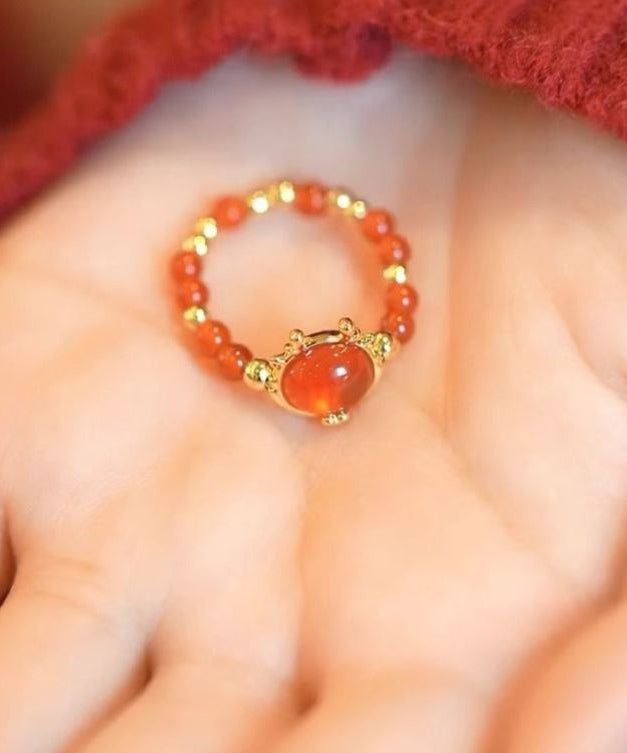 Stilvolles, zweiteiliges Ringset aus rotem Sterlingsilber mit vergoldetem Kristall KX1036