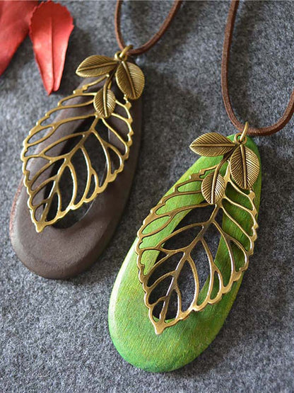 Artsy Hollow Out Metal Leaf Oval Wool Necklace AT1058