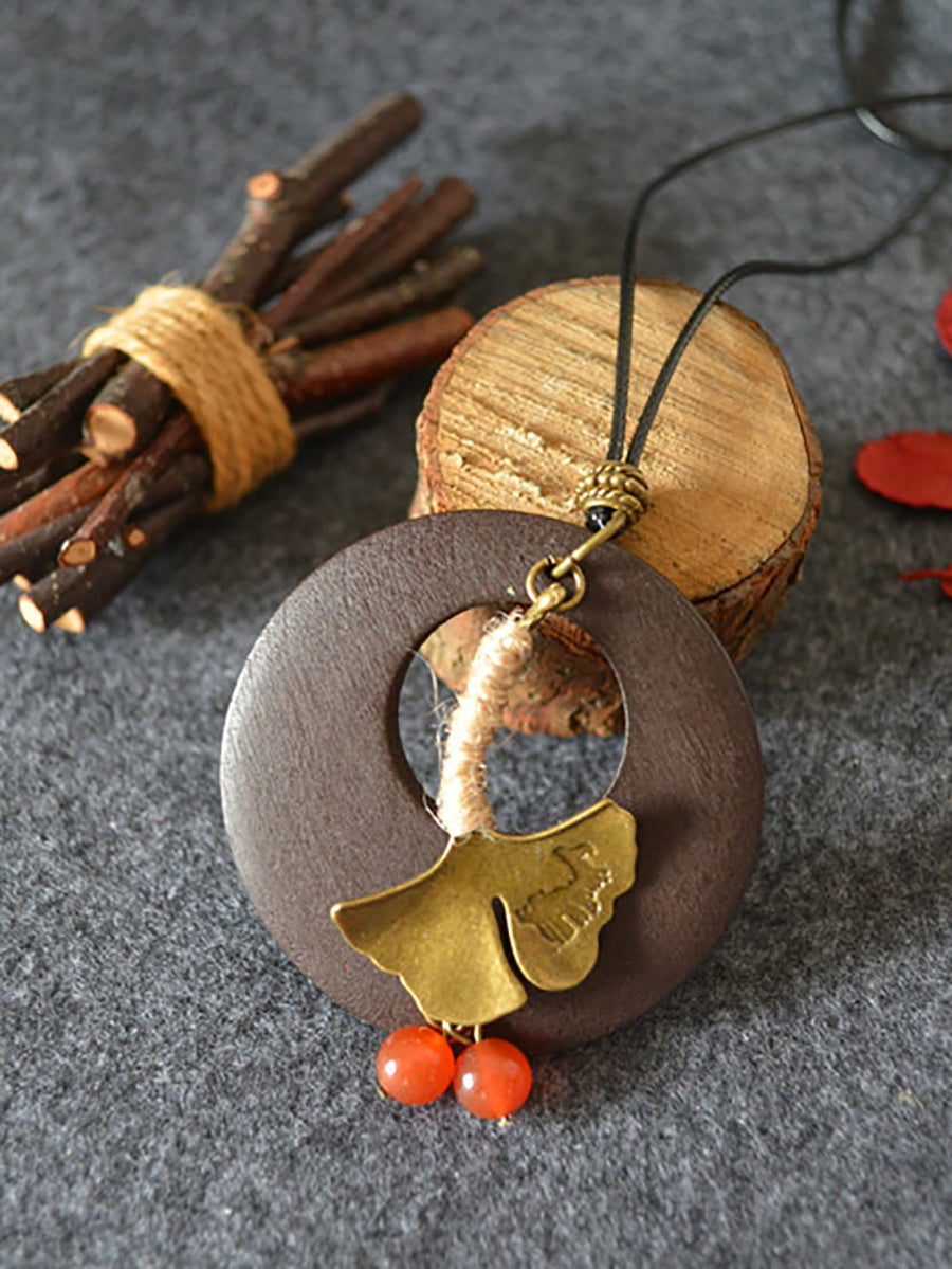 Collier rond en bois avec feuille en alliage pour femme KL1042