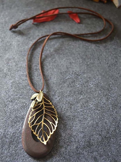 Artsy Hollow Out Metal Leaf Oval Wool Necklace AT1058