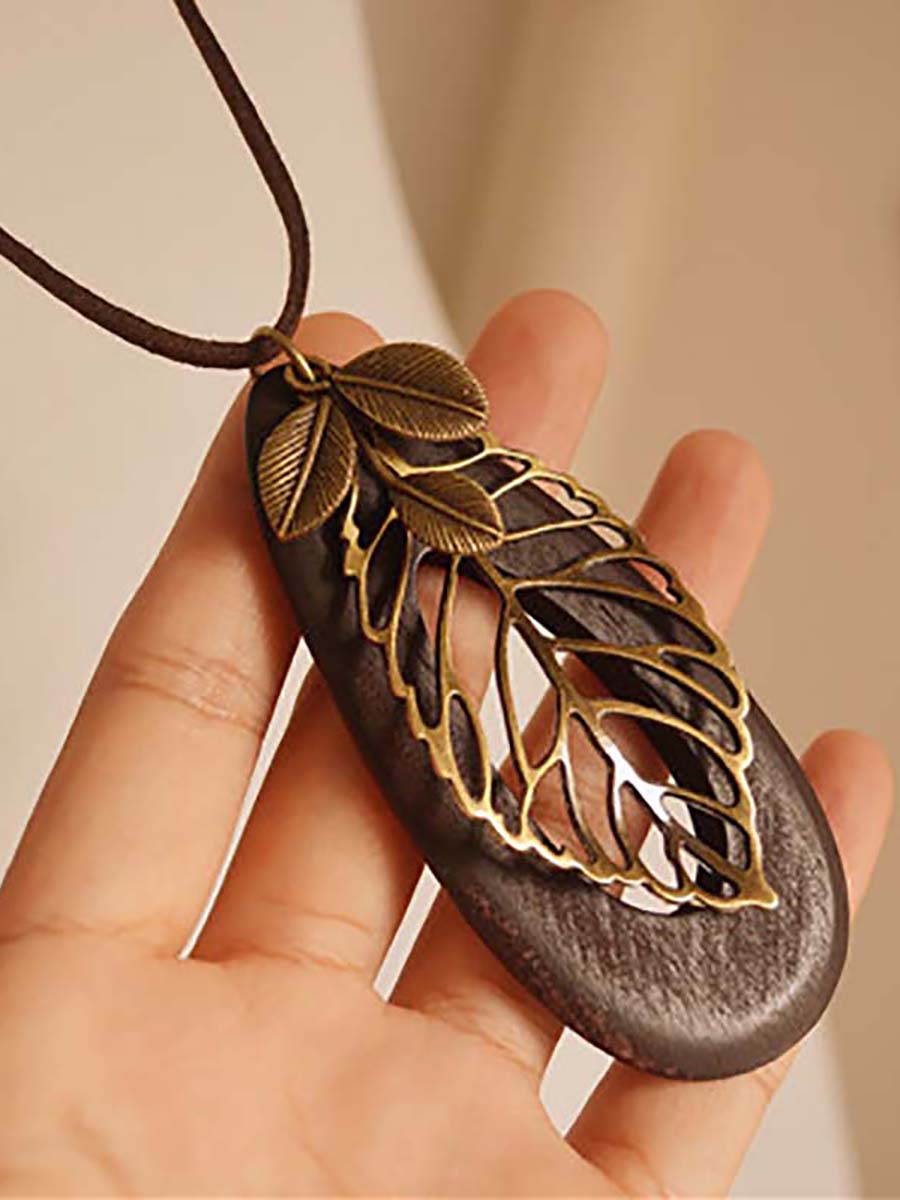 Artsy Hollow Out Metal Leaf Oval Wool Necklace AT1058