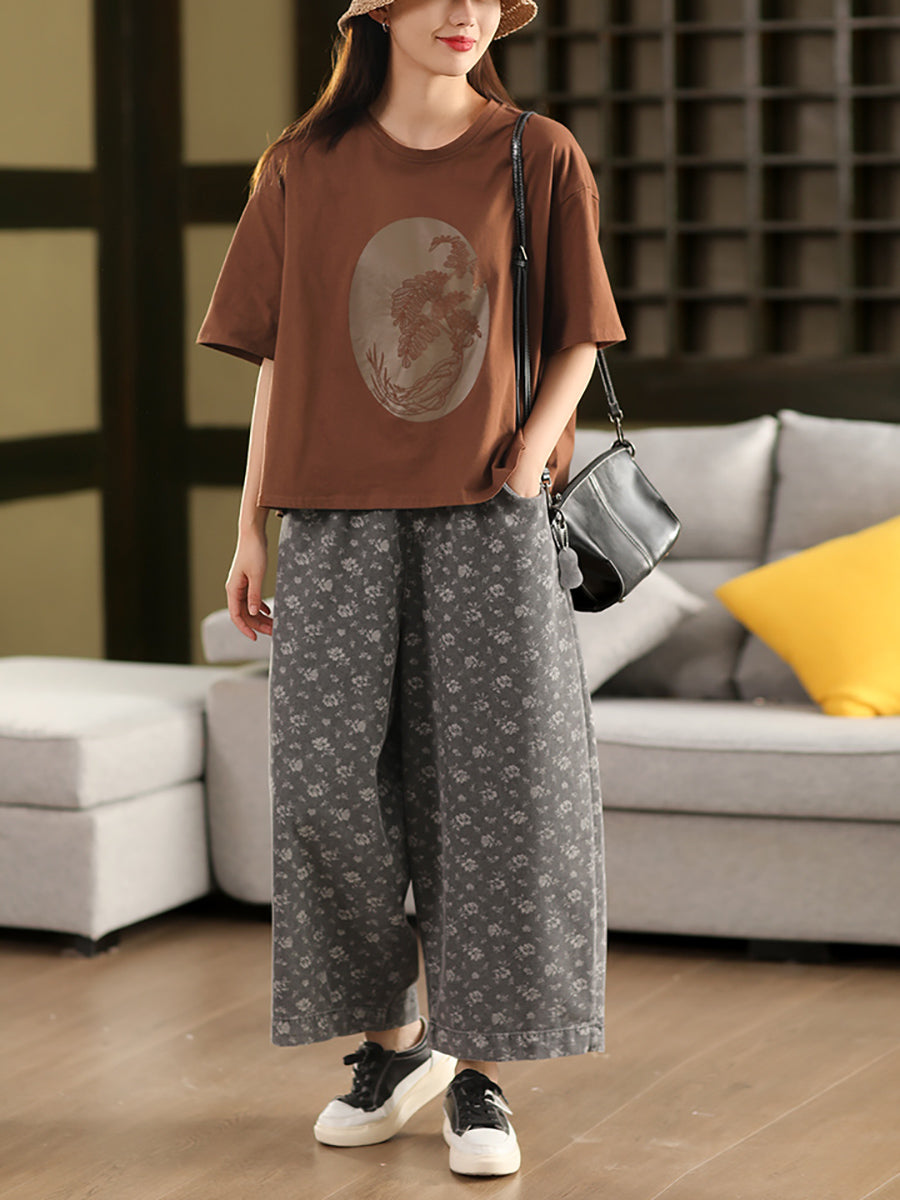 Abgenutzte Denim-Hose mit weitem Bein und Blumenmuster für Damen 