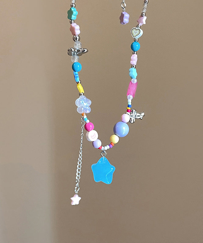 Collier avec pendentif arc-en-ciel en cuivre et perles en résine et pompon d'amour