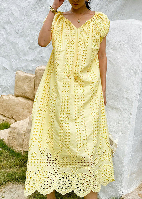 Robe longue en coton jaune à col rond et ajourée
