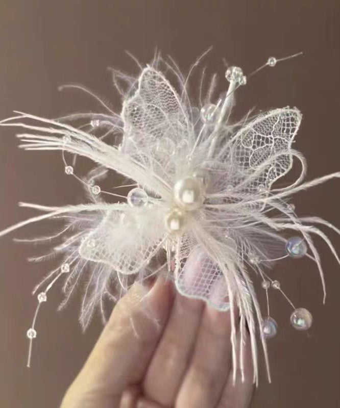Culotte perle beige en dentelle à épingles à cheveux ajourée avec plumes