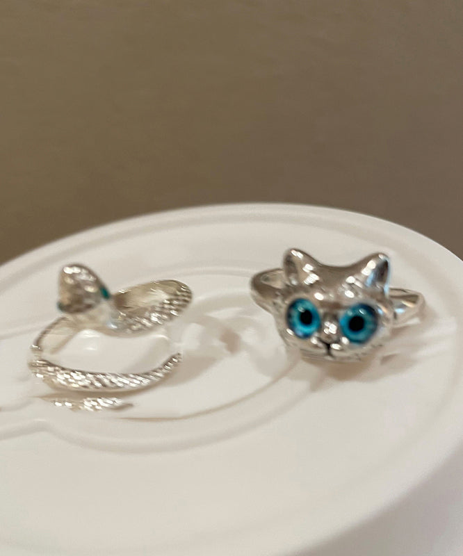 Schickes zweiteiliges Ringset aus Glaslegierung mit kleinen Katzen und Schlangen in Blau ZZ069