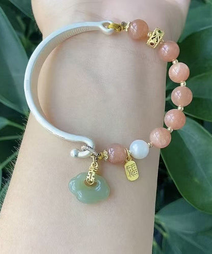 Bracelet à breloques chic en argent sterling rose incrusté de jade et nuages ​​de bon augure AB1095