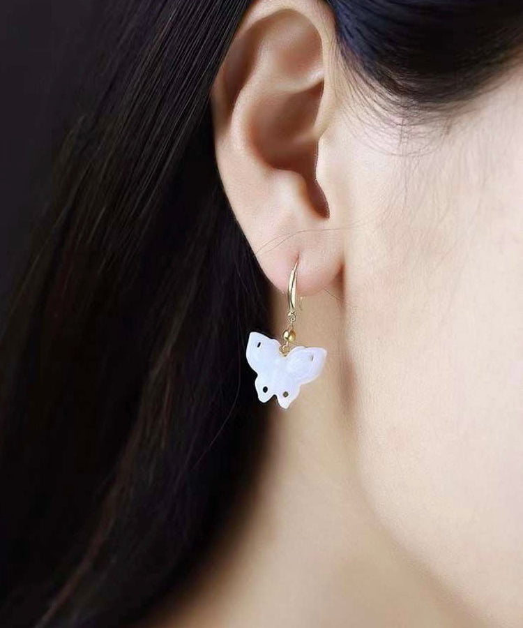 Boucles d'oreilles pendantes en argent sterling blanc avec pendentif papillon en jade surdoré QU032