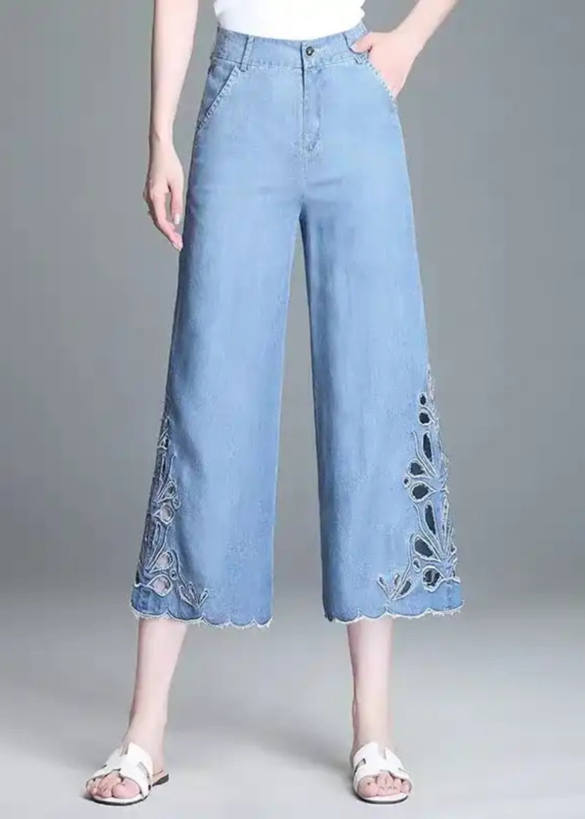 Elegante, hoch taillierte, hohle Sommer-Crop-Out-Blaujeans