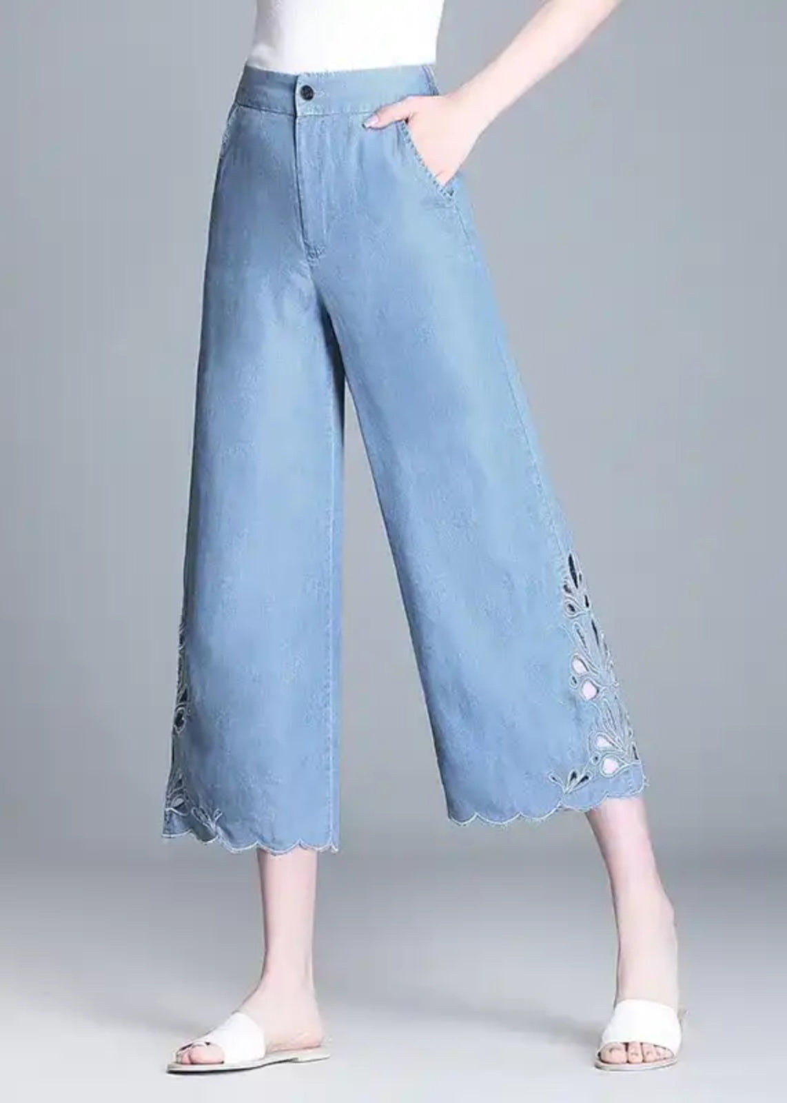 Elegante, hoch taillierte, hohle Sommer-Crop-Out-Blaujeans