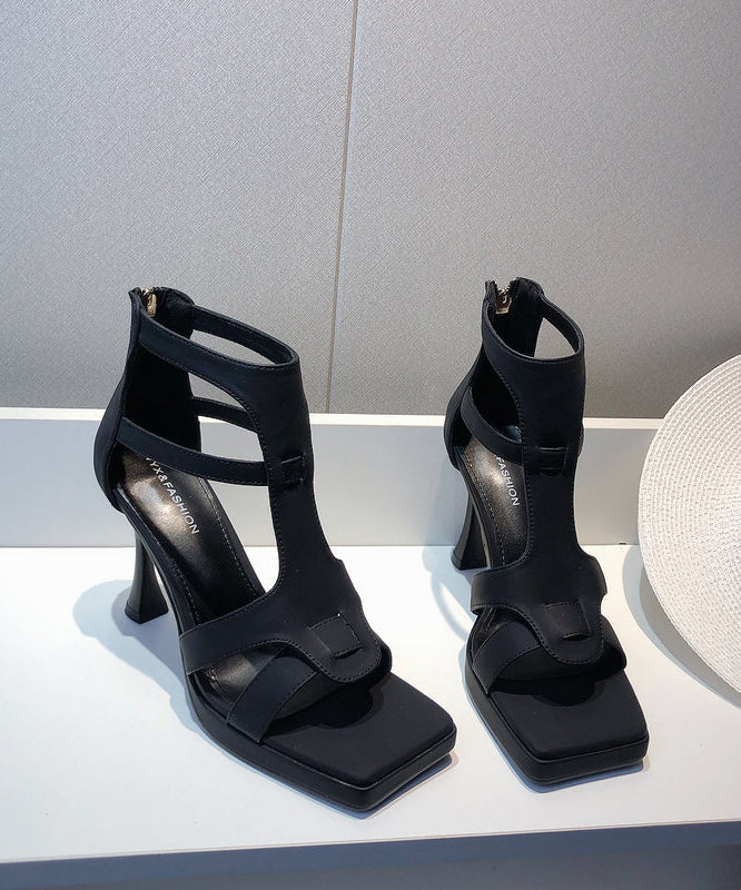 Sandales à bout ouvert noires à talons hauts et à épissures creuses