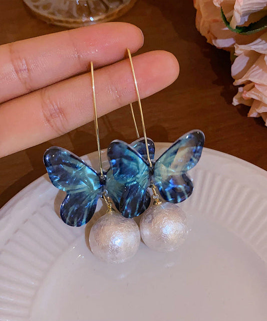 Boucles d'oreilles pendantes en forme de papillon avec perles acryliques bleues fines PO076