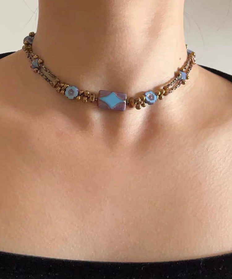 Collier de perles graduées en cuivre bleu fin surdoré QU015