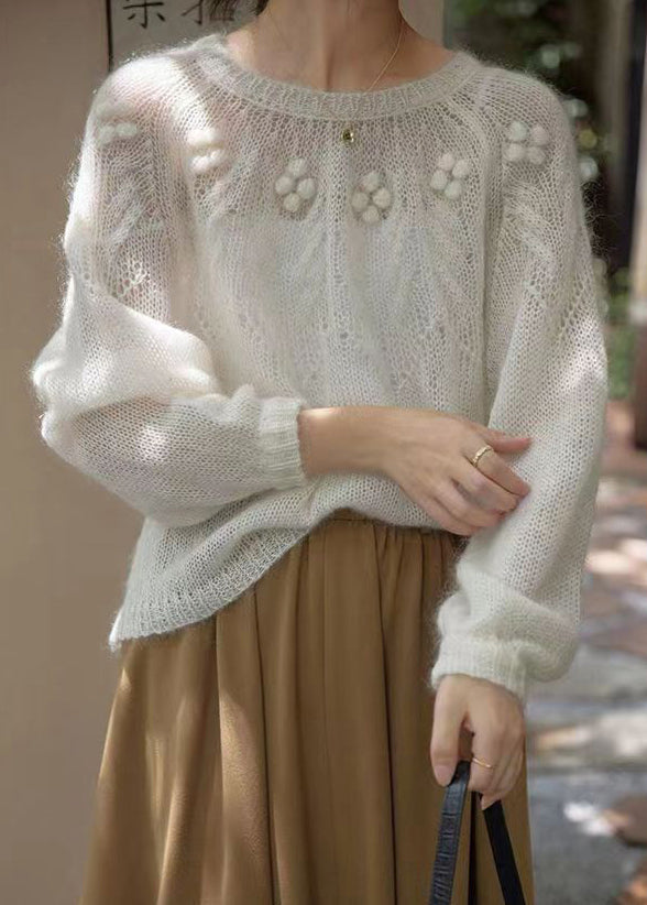 Pull en maille patchwork blanc à col rond et manches longues TU025