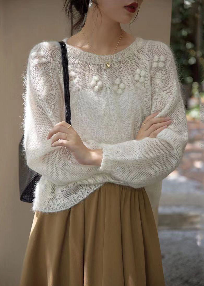 Pull en maille patchwork blanc à col rond et manches longues TU025
