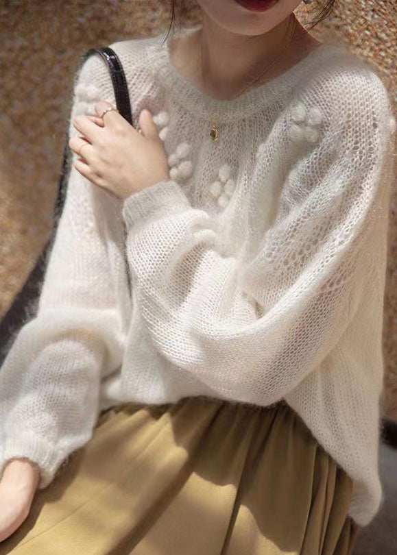 Pull en maille patchwork blanc à col rond et manches longues TU025