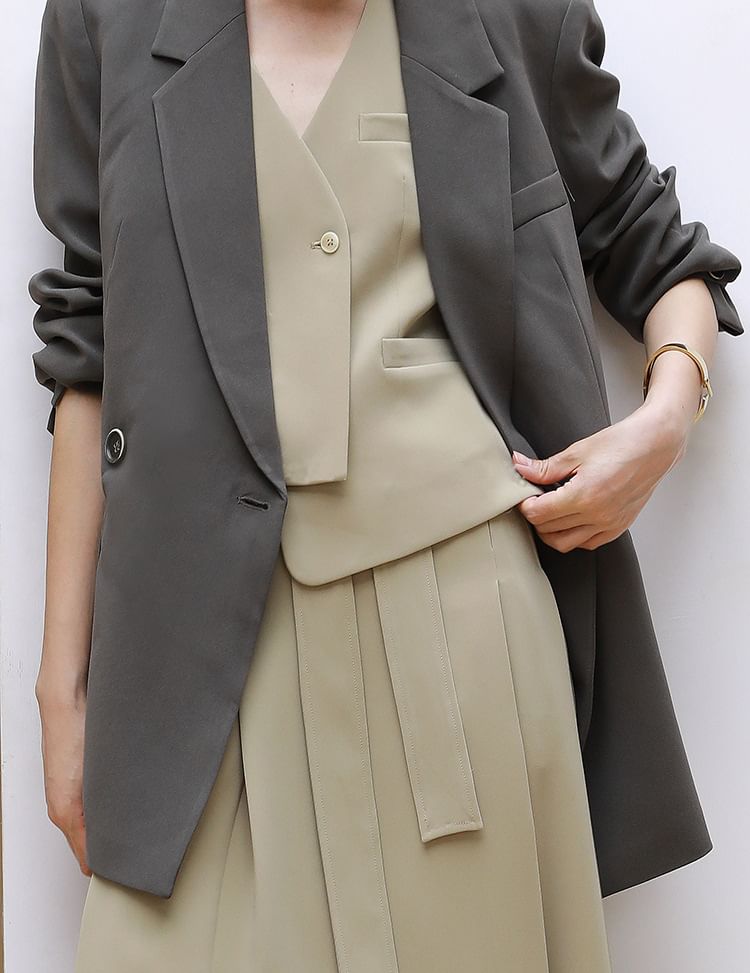 V-Neck Asymmetrical Vest / Midi A-Line Skirt