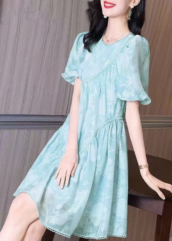 Robe mi-froissée à col rond bouffant et manches légères, bleue