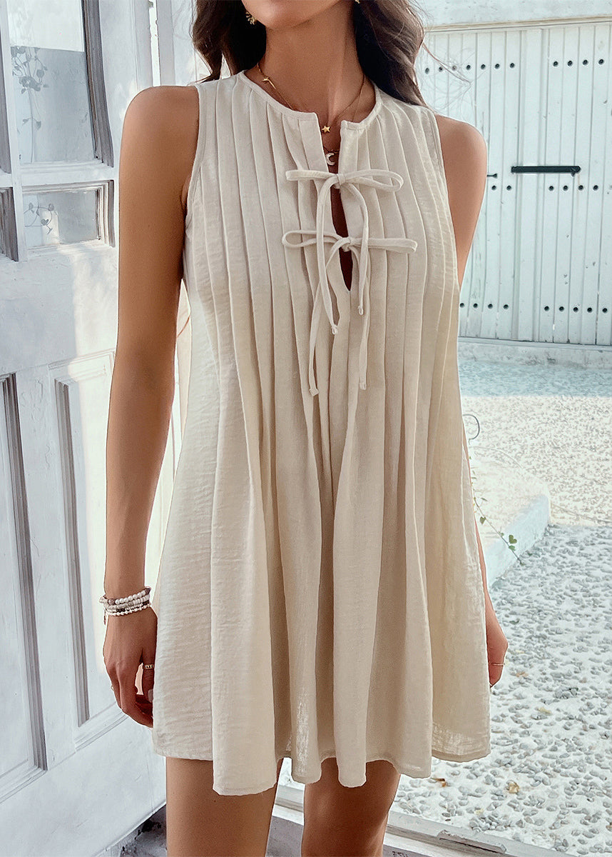 Robe mi-longue ample sans manches en coton abricot avec nœud froissé