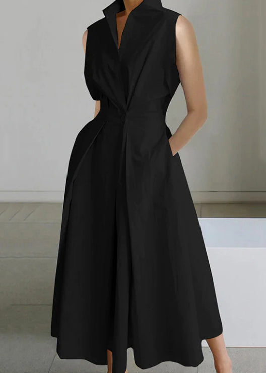 Robe longue sans manches à boutons et poches amples en coton blanc