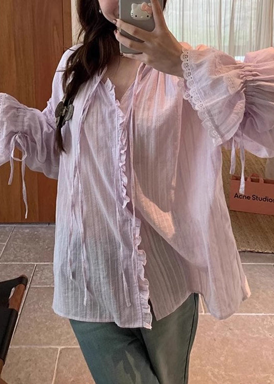 Chemise blanche évasée en coton à dentelle et manches amples à volants