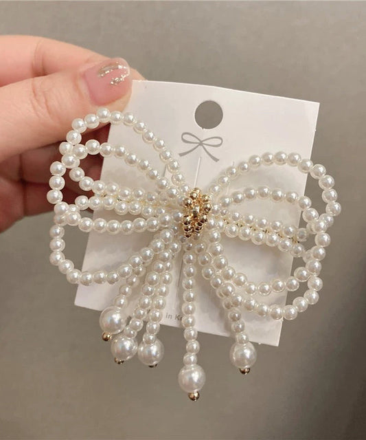 Épingle à cheveux moderne en cristal blanc avec nœud en perles QQ063