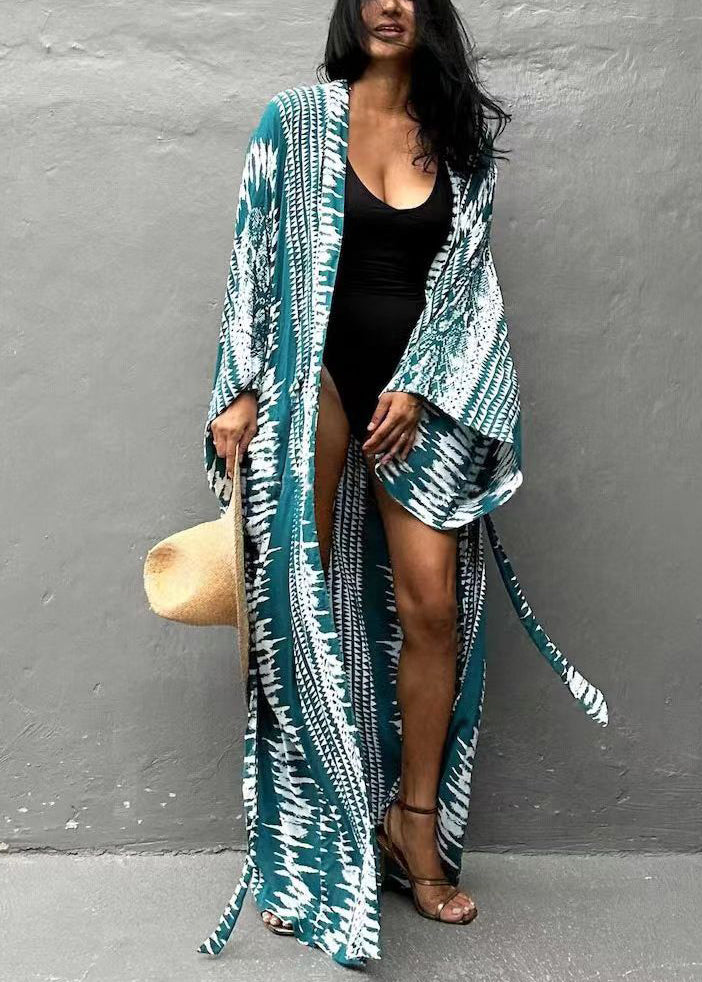 Blouse longue à manches longues avec teinture par nouage bleu naturel et taille nouée sur la plage GH1008