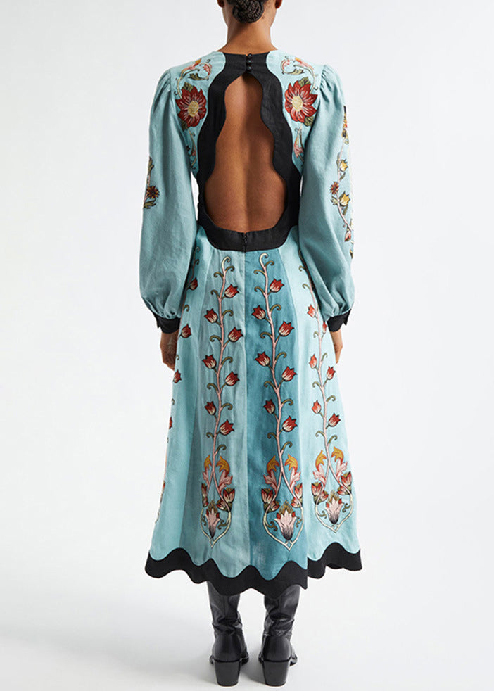 Robe longue originale en coton à col en V et imprimé bleu printanier dos nu