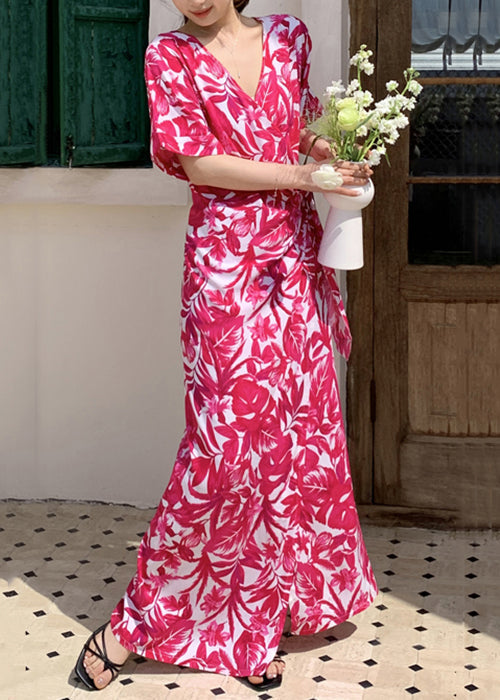 Robe longue d'été en coton imprimé rose à la taille et col en V
