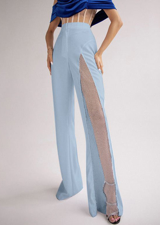 Pantalon slim bleu en élasthanne patchwork ajouré pour l'été