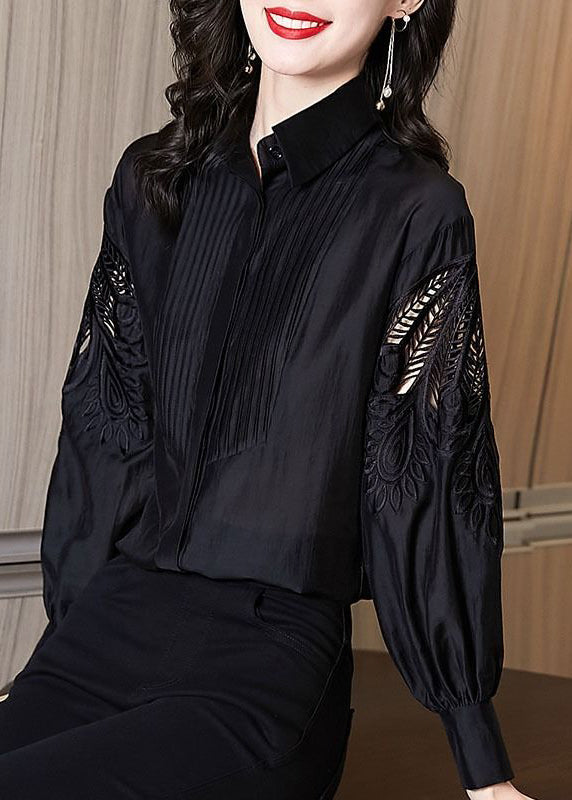 Chemise noire élégante brodée à manches bouffantes TE026