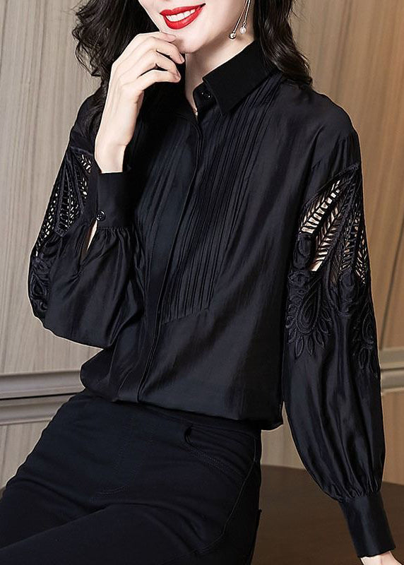 Chemise noire élégante brodée à manches bouffantes TE026