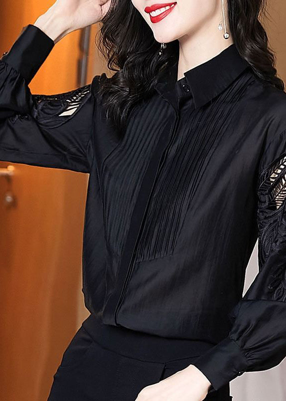 Chemise noire élégante brodée à manches bouffantes TE026