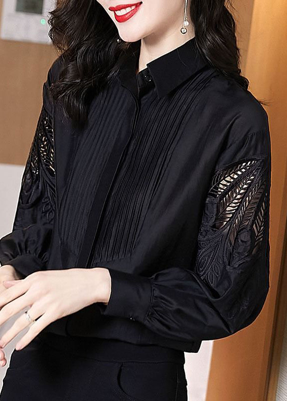 Chemise noire élégante brodée à manches bouffantes TE026