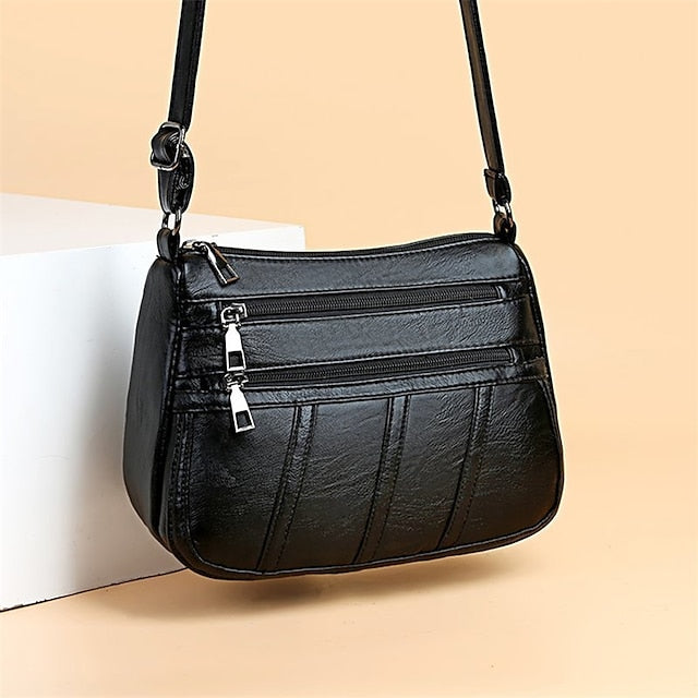 Schwarze Umhängetasche aus Kunstleder im stilvollen Stil – Damen