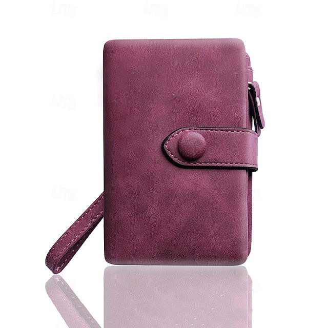 Damen Geldbörse mit Handgelenkschlaufe aus Kunstleder in Rosa –
