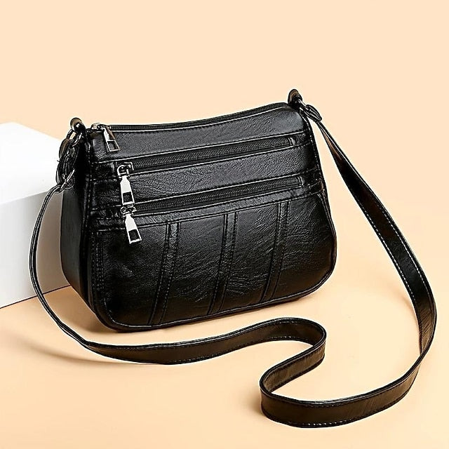 Schwarze Umhängetasche aus Kunstleder im stilvollen Stil – Damen